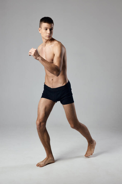 guy in shorts running indoor sport fitness athletics model - 写真・画像