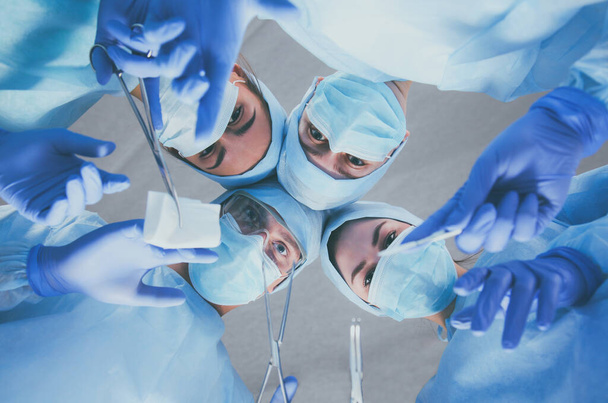 Team surgeon at work in operating room. - Zdjęcie, obraz