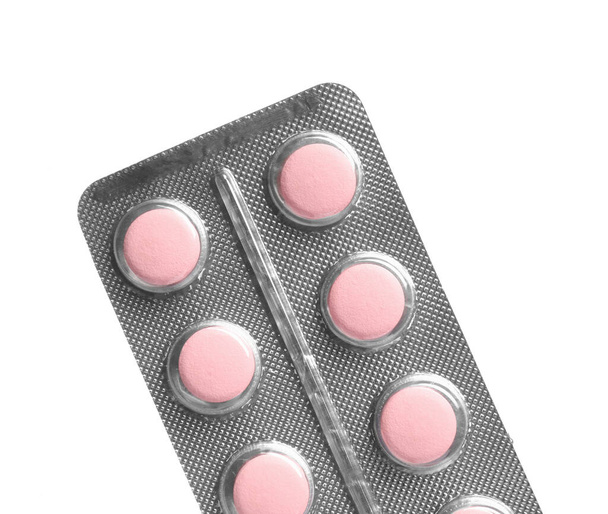 Blisterverpackung mit Pillen auf weißem Hintergrund - Foto, Bild