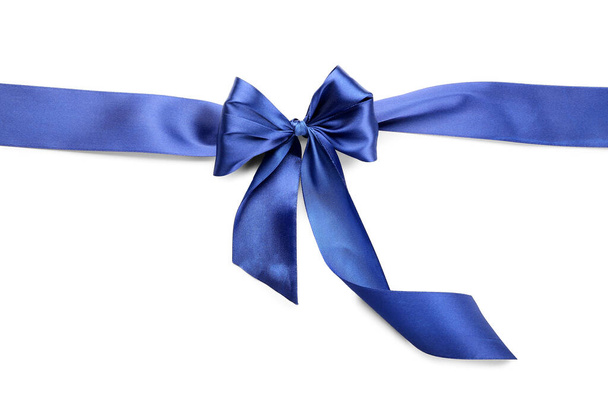 Blue ribbon with bow on white background - Foto, Imagen