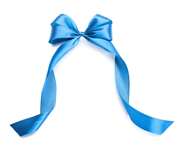 Beautiful bow made from blue ribbon on white background - Photo, Image
