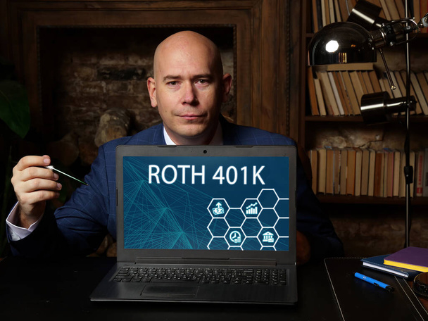 Business concept meaning ROTH 401K with phrase on the laptop. Creative photo about an employer-sponsored investment savings account - Photo, Image