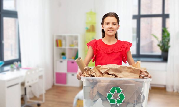smiling girl sorting paper waste - Φωτογραφία, εικόνα