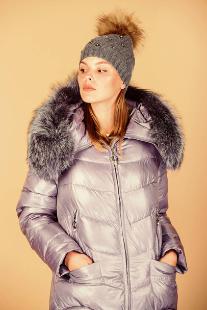 Warming up. Casual winter jacket slightly more stylish and have more comfort features such as larger hood fur trim on hood. Faux fur. Fashion girl winter clothes. Fashion coat and hat. Fashion trend - Foto, Imagem