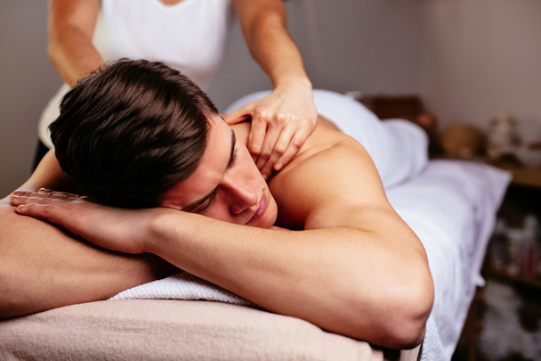 Man having his back massaged - Foto, imagen