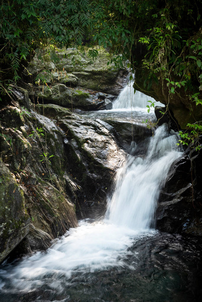 Beautiful rainforest waterfall with crystal clear water on green landscape, Serrinha do Alambari, Mantiqueira Mountains, Rio de Janeiro, Brazil - Fotó, kép