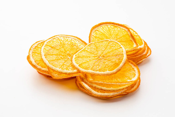 Orange dried fruits heap close up isolated - Zdjęcie, obraz