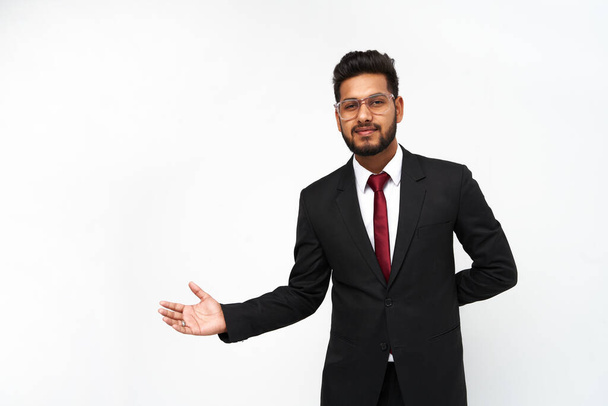 Portrait of young indian businessman on white isolated background. - Фото, зображення