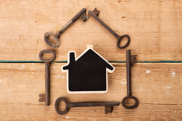 home security concept - little house and old keys - Fotografie, Obrázek