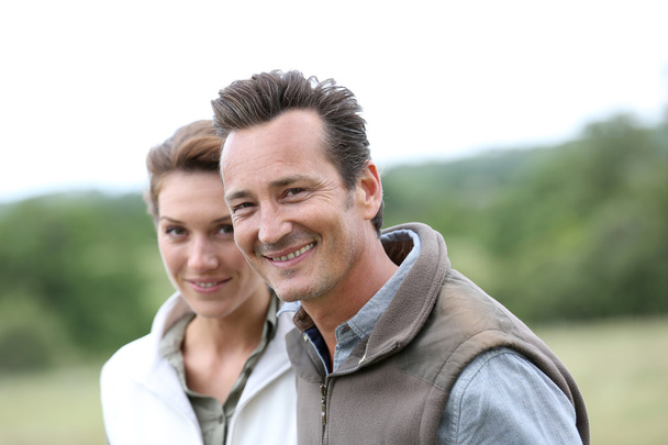 Mature couple in countryside - Photo, Image