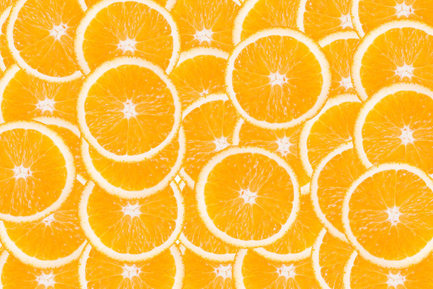 Pozadí mnoha plátků pomerančů - Fotografie, Obrázek