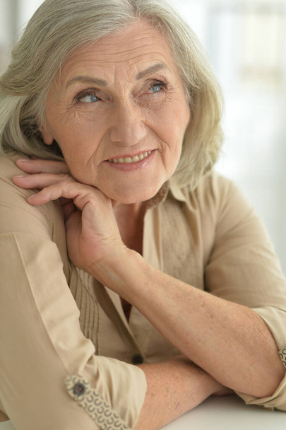 beautiful senior woman posing at home  - Фото, изображение