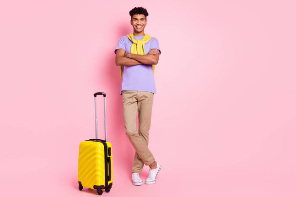 Full body photo of young african guy happy smile crossed hands baggage trip vacation isolated over pink color background - Φωτογραφία, εικόνα