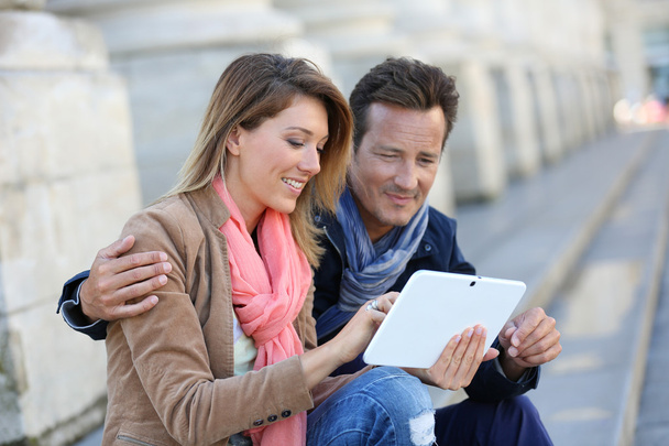 Couple using digital tablet - Fotó, kép