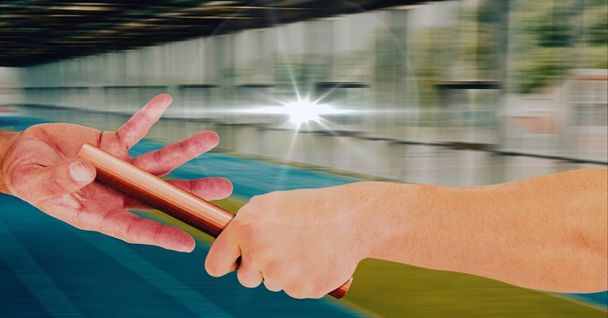 Composition of caucasian athletes passing orange relay baton with glowing light. championships, sports and competition concept digitally generated image. - Zdjęcie, obraz