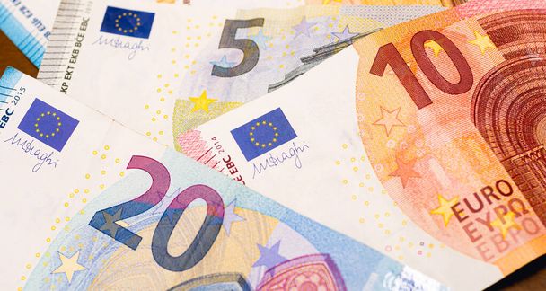 Money, Euro - EUR. Euro banknotes in close-up. Finance, economy, income and investments concept. - Photo, Image