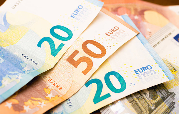 Money, Euro - EUR. Euro banknotes in close-up. Finance, economy, income and investments concept. - Foto, Bild