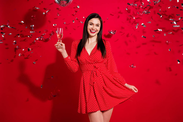Photo of chic impressed brunette lady hold glass drink wear red dress isolated on vivid color background - Fotoğraf, Görsel