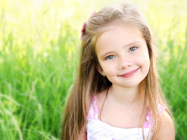 Portrait of adorable smiling little girl - Foto, immagini