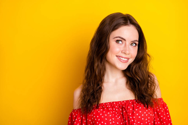 Photo of dreamy nice pretty young woman look empty space smile isolated on bright yellow color background - Photo, Image