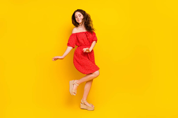 Full body photo of young girl happy positive smile have fun dance party isolated over yellow color background - Zdjęcie, obraz