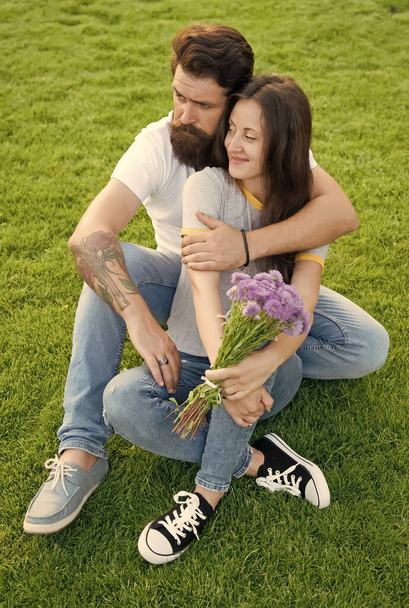 Carefree couple in love cuddling relax in park, more than friends concept - Photo, Image