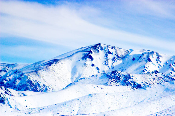 Snowy mountains on nature background - Valokuva, kuva