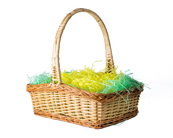 Easter basket on plain white background - Foto, afbeelding