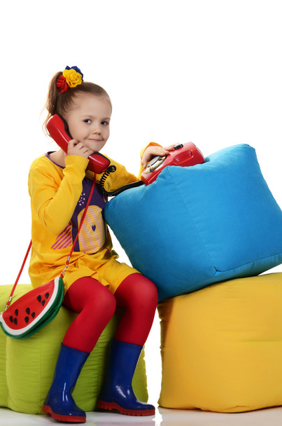 Studio portrait of cute little girl  with colour cubes - Фото, изображение