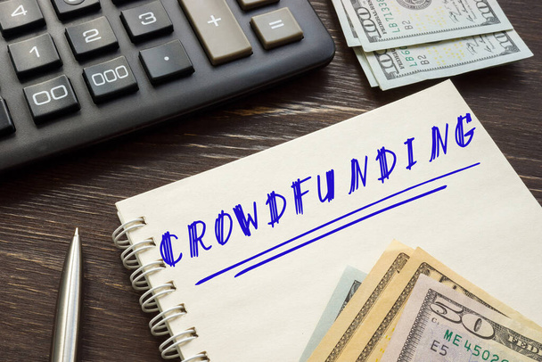 Business concept about CROWDFUNDING with inscription on the sheet. - Photo, Image