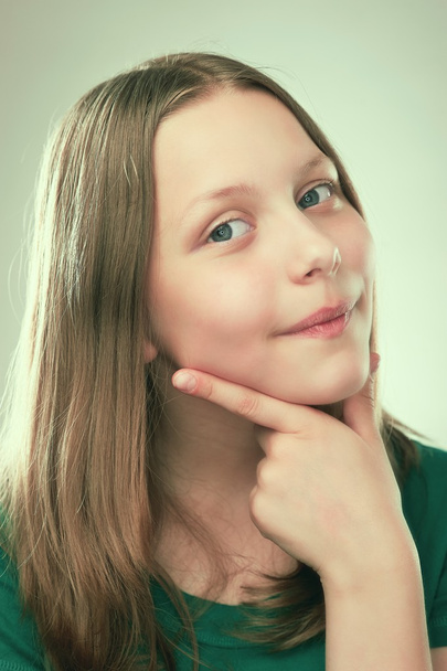 Portrait of a thinking teen girl - Фото, изображение