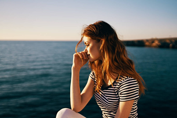 woman near the sea at sunset summer t-shirt sky model - 写真・画像