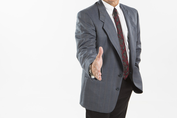 zakenman aanbieden voor handdruk - Foto, afbeelding