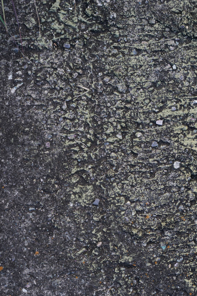 A vertical background of rough gray stone texture - Foto, imagen