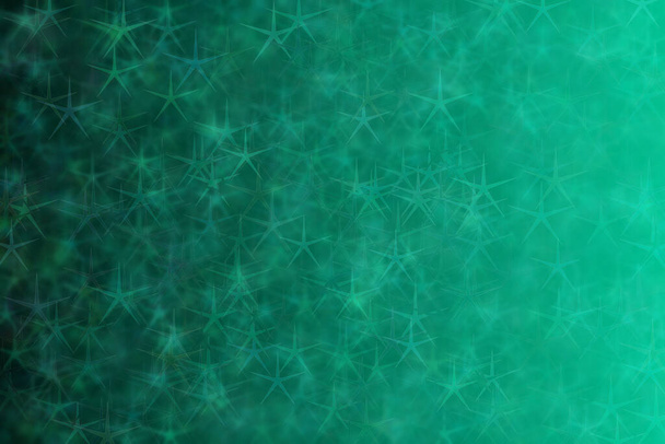 μέντα πράσινο έως σκούρο πράσινο αφηρημένο defocused φόντο με αστέρι σχήμα bokeh κηλίδες - Φωτογραφία, εικόνα