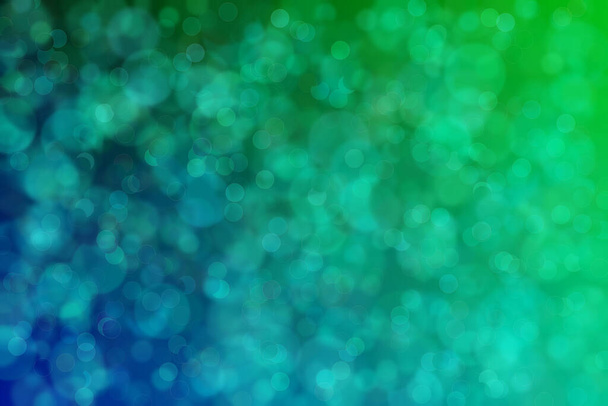 Абстрактный красивый гармонический фон с оттенками зеленого и синего цветов и узорами в форме кругов. - Фото, изображение
