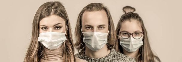 Crowd of people wearing medical masks. Coronavirus epidemic concept. Group of people wearing protective medical mask for protection from virus disease - Photo, Image