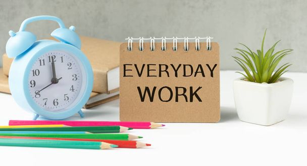 everyday work. Text on white paper on gray background - Fotó, kép