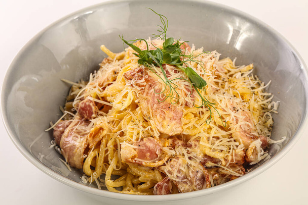 Italian traditional Pasta Carbonara with bacon and cheese - Фото, изображение