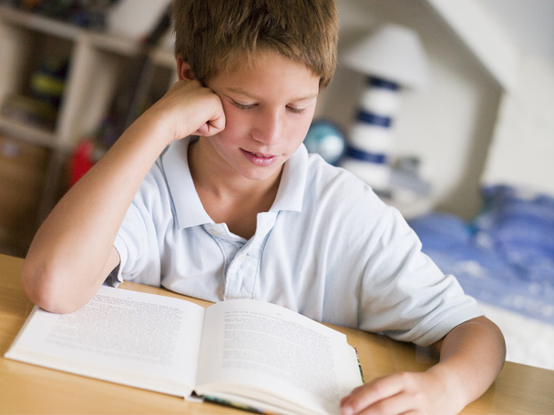 Young Boy Reading A Book In His Room - Photo, image