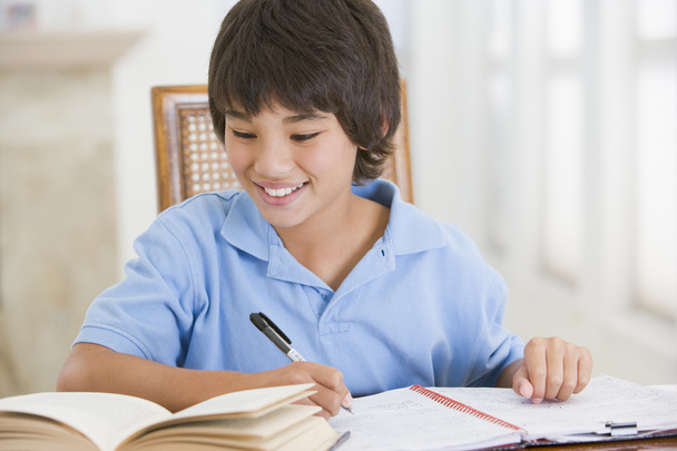 Boy Doing His Homework - Фото, изображение