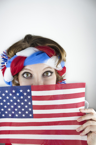Woman holding American flag - Fotó, kép