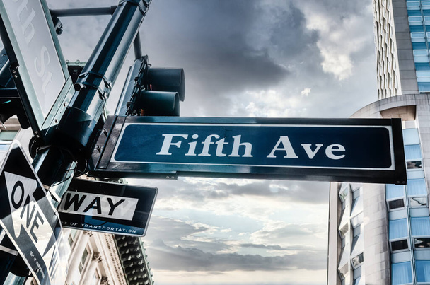 Blue Fifth Ave Sign with cloudy skiy, low angle in New York, USA - Fotoğraf, Görsel
