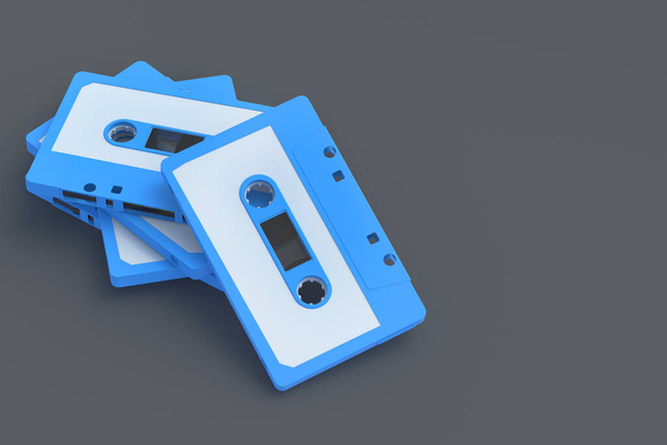 Heap of vintage audio cassettes tape of blue color on gray background. Music storage. Retro cartridge. Copy space. 3d render - Fotoğraf, Görsel