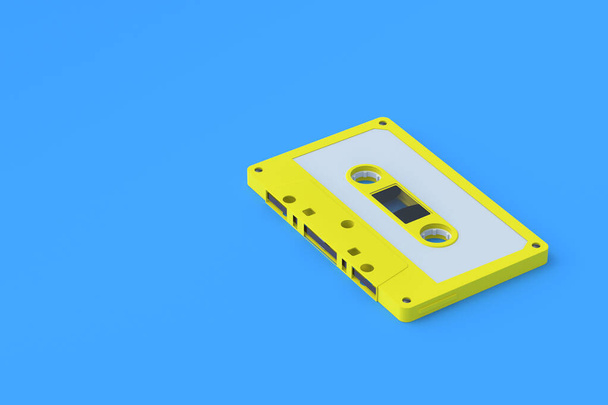 Single vintage audio cassette tape of yellow color on blue background. Music storage. Retro cartridge. Copy space. 3d render - Photo, image