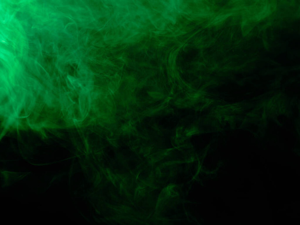Green smoke isolated on black background - Foto, immagini