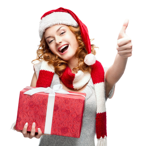happy young woman holding gift on white - Foto, Imagem