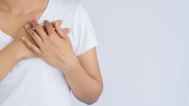woman with chest pain and suffering health and medical concepts - Photo, image