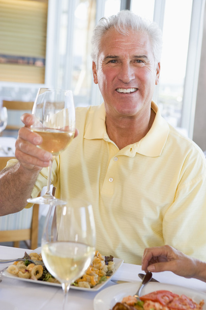 Man Enjoying meal,mealtime With A Glass Of Wine - Фото, зображення