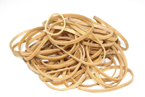 Isolated Collection of Elastic Bands Stacked in a Heap - Photo, Image